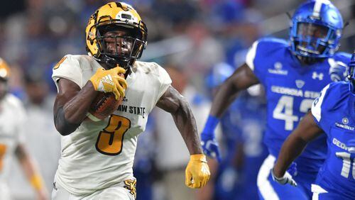 Kennesaw State quarterback Donovan Taitt (9) breaks away for a long first down run in the second half the season opening game against Georgia State Thursday, Aug. 30, 2018, at Georgia State Stadium in Atlanta.