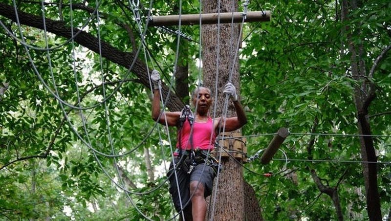 Carolyn Hartfield, 68, wasn’t always an outdoor enthusiast, but once she got into outdoor activities, she wanted to share her enthusiasm with others in her age group. Here, she participated in a Treetop Quest Obstacle Course. CONTRIBUTED