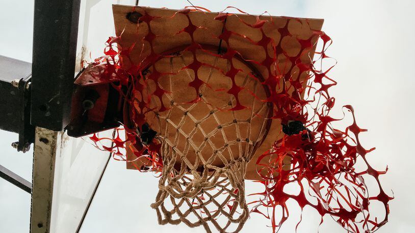 Slammed Shut: the basketball goal at Decatur’s Winnona Park Elementary where, for an indeterminate period, no dunks nor long range jumpers will grace this net. Bill Banks for the AJC