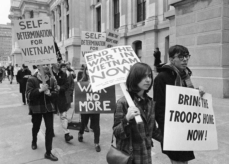 FILE - Picketers demonstrate against the Vietnam War as they march through downtown Philadelphia, March 26, 1966. They’re hallmarks of American history: protests, rallies, sit-ins, marches, disruptions. They date from the early days of what would become the United States to the sights and sounds currently echoing across the landscapes of the nation’s colleges and universities. (AP Photo/Bill Ingraham, File)