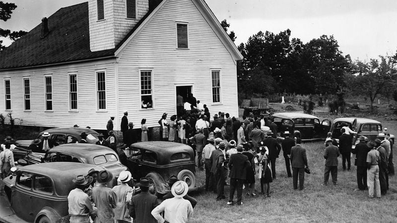 A crowd gathers at the Mt. Perry church near Monroe, GA., for funeral services July 28, 1946 for George Dorsey and Dorothy Malcolm, bother and sister, two of the four Negro victims of a mob. The church is about 16 miles from the lynching site. (Associated Press photo)
