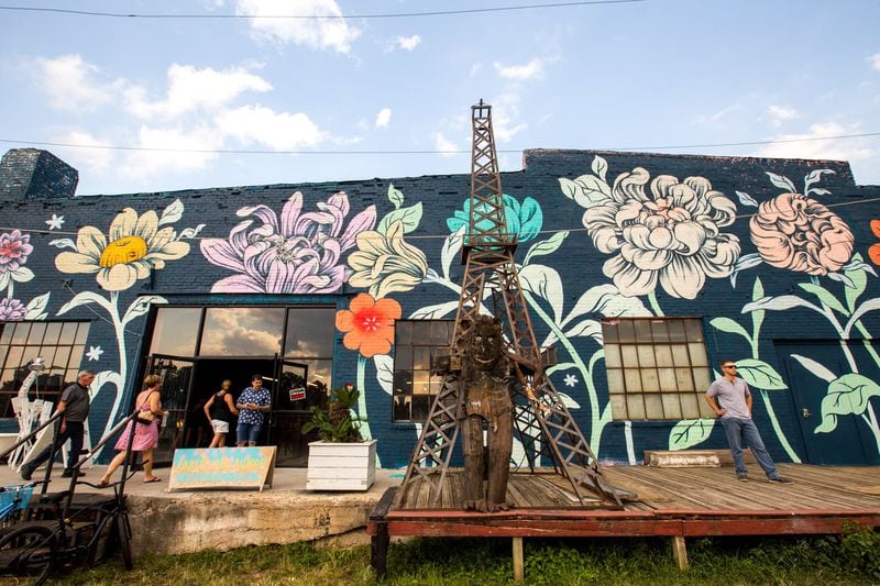 The Eastside Beltline benefits from projects like the OuterSpace series, which produced this mural by Detroit-based artist Ouizi at Paris on Ponce. The Beltline is continuing to evolve with new art installations, murals and sculptures. (Jenni Girtman/Atlanta Event Photography)
