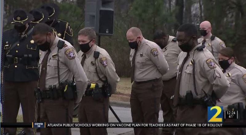 Law enforcement officers gathered Friday morning to pay their respects to Henry County Deputy Nicholas Howell, who died last weekend of complications from COVID-19.