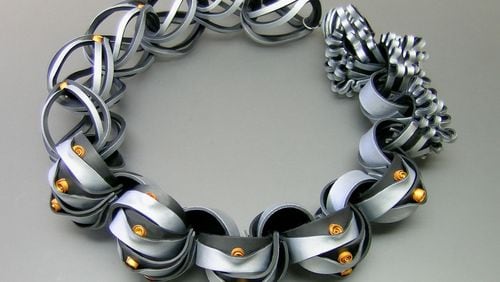 Engineer-turned-artist Wiwat Kamolpornwijit creates extremely lightweight jewelry from polymer clay, silver and beads. Photo credit: Kamolpornwijit.com