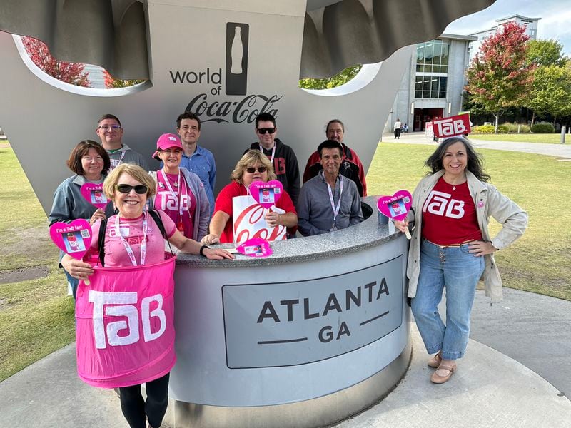 A group of fans of Tab, which Coca Cola dropped from retail shelves in 2020, came to the World of Coke on Oct. 20, 2023 to try to convince the beverage company to bring the diet soda back. RODNEY HO/rho@ajc.com