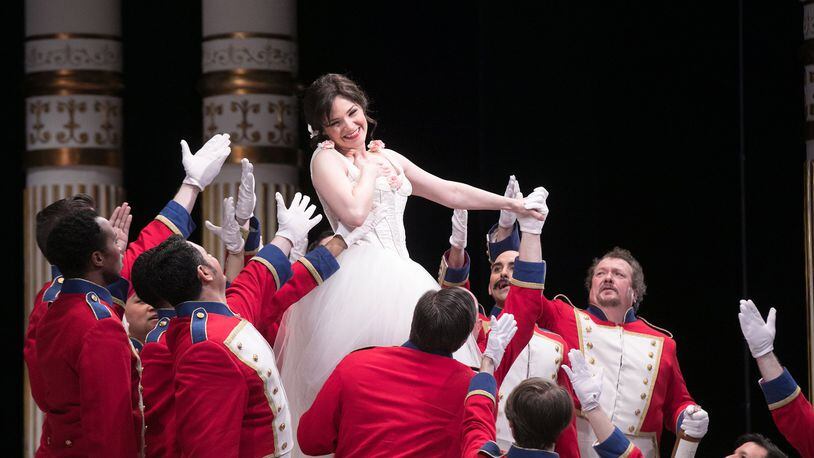 Andriana Chuchman performs with members of the Atlanta Opera chorus in “The Daughter of the Regiment.” CONTRIBUTED BY JEFF ROFFMAN
