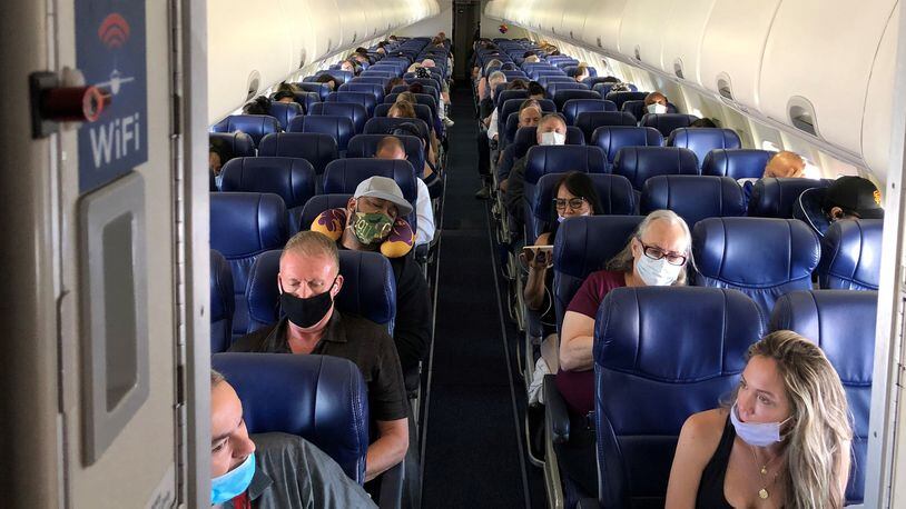 Masked passengers fill a Southwest Airlines flight from Burbank, California, to Las Vegas on June 3, 2020, with middle seats left open. (Christopher Reynolds/Los Angeles Times/TNS)