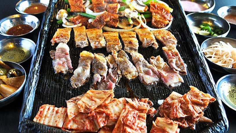 Korean BBQ- unlimited pork belly, beef brisket BBQ, and Bi-bim-bab at Iron Age.