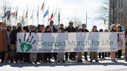 Marchers line up Friday on Capitol Avenue for the Georgia March for Life in downtown Atlanta. (REANN HUBER/REANN.HUBER@AJC.COM)