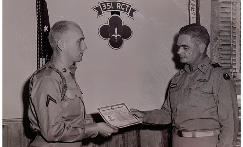 Gerhardt Hoff (left) is pictured at his naturalization ceremony in August 1955 at Fort Rucker in Alabama, where he served in the 351st RCT. Hoff, 89, a local businessman born in Vienna in 1930, died April 22 due to complications from COVID-19. FAMILY PHOTO
