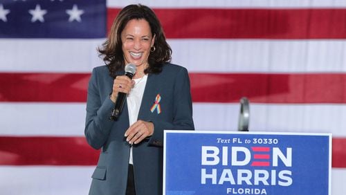 Democratic vice presidential nominee Sen. Kamala Harris responds to cheering supporters as she takes the stage for an early-voting event at the Central Florida Fairgrounds, Monday, October 19, 2020.  (Joe Burbank/Orlando Sentinel/TNS)