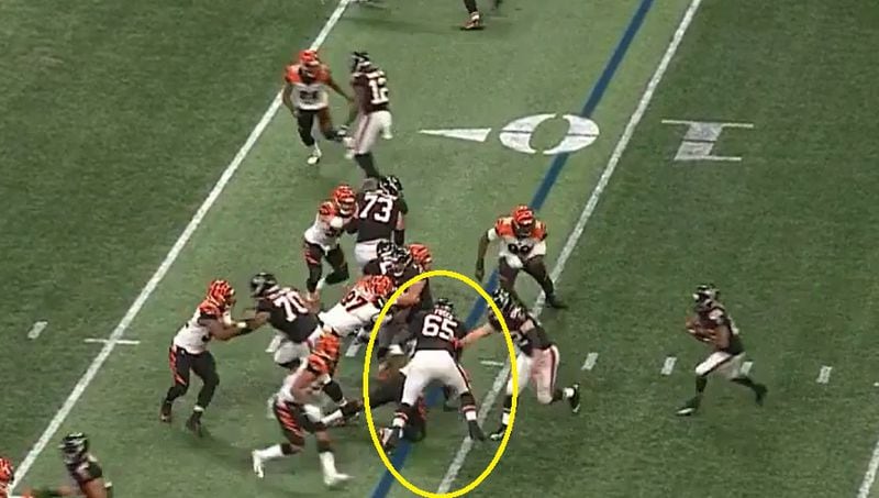 Falcons guard Brandon Fusco was called for a questionable holding penalty here when the Bengals lineman basically dove to the ground. 