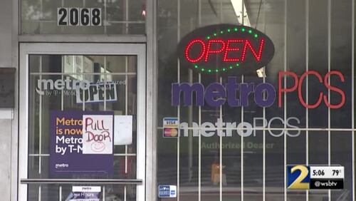 Two armed men robbed this Metro PCS store in East Point over the weekend, police said.