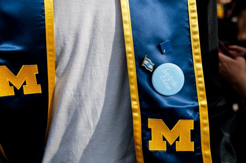 Graduate Ari Belchinsky wears pro-Israel pins during the University of Michigan's Spring 2024 Commencement Ceremony at Michigan Stadium in Ann Arbor, Mich., on Saturday, May 4, 2024. (Jacob Hamilton/Ann Arbor News via AP)