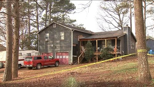 Paulding County investigators are working to piece together what happened at a Mill Road home before a man was shot dead and another was stabbed and critically injured early Sunday morning.