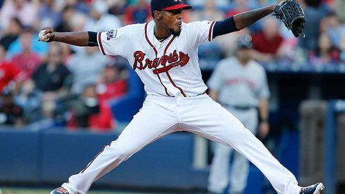 Braves starting pitcher Julio Teheran delivers in the first inning of a baseball game against the Philadelphia Phillies Saturday, July 30, 2016, in Atlanta. (AP Photo/John Bazemore)