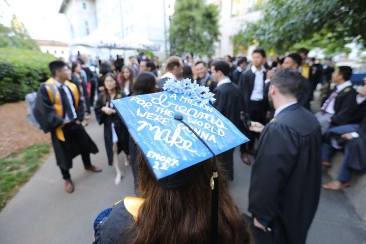 Student from the Bussiness School Katalia Alexander had a message on her hat before the beginning of the ceremony during the Emory University’s 2022 Commencement on Monday, May 9, 2022. Miguel Martinez /miguel.martinezjimenez@ajc.com