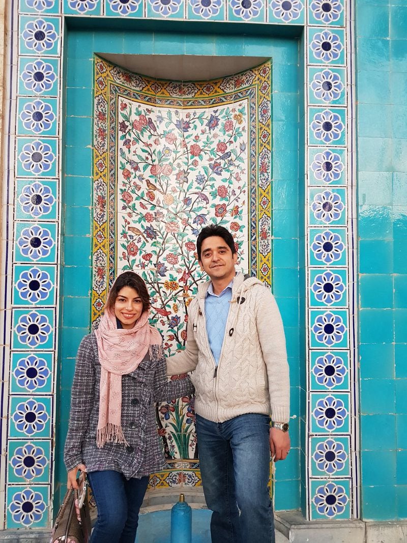 Newsha Tavakoli visits the Tomb of Saadi last year with her husband, Mohamad Esnaashari, in Shiraz, Iran. She fears she might have to leave the U.S. for good for them to be together. CONTRIBUTED