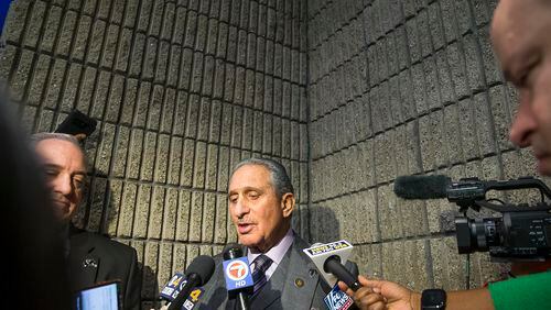 Atlanta Falcons owner Arthur Blank (center) answers questions during a media scrum following a 'Welcome to Super Bowl LIII' press conference at the Georgia World Congress Center in Atlanta, Monday, January 28, 2019. (ALYSSA POINTER/ALYSSA.POINTER@AJC.COM)