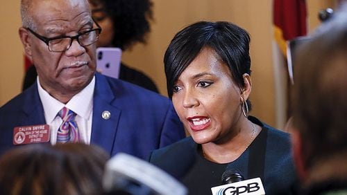 Rep. Calvin Smyre D - Columbus, watches as Atlanta Mayor Keisha Lance Bottoms talks with the media after she addressed the house. The Georgia General Assembly continued with the second legislative day of the 2020 session.