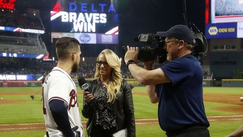 Former Fox Sports South Braves reporter Kelsey Wingert interviews former Braves center fielder Ender Inciarte after an April 21, 2018, game at SunTrust Park (now Truist Park). (File photo by Mike Zarrilli)