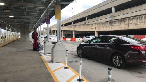 The new Hartsfield-Jackson domestic Terminal North pickup zone for Uber and Lyft opened Sunday, Dec. 23, 2018.