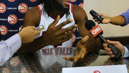 092914 ATLANTA: Hawks forward DeMarre Carroll says he doesn't believe that general manager Danny Ferry is a racist and hopes he returns to the team during Media Day at Philips Arena on Monday, Sept. 29, 2014, in Atlanta. CURTIS COMPTON / CCOMPTON@AJC.COM Hawks forward DeMarre Carroll sat out Monday's exhibition win over the Pelicans with a right ankle injury.