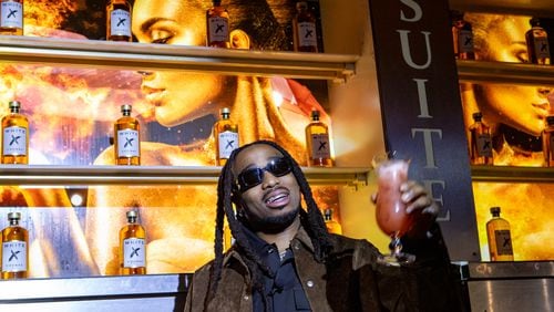 Rapper Quavo partners with White X cognac and attends a tasting at Suite Lounge on Wednesday, January 24, 2024.  (Jenni Girtman for The Atlanta Journal-Constitution)