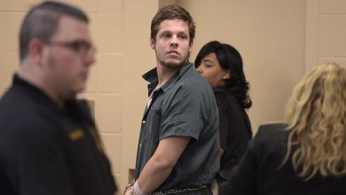 Jacob Kosky of McDonough is lead out of the courtroom in McDonough last November. Kosky was indicted Tuesday for shooting and killing four people at a house in Henry County Oct. 26. (DAVID BARNES / DAVID.BARNES@AJC.COM)