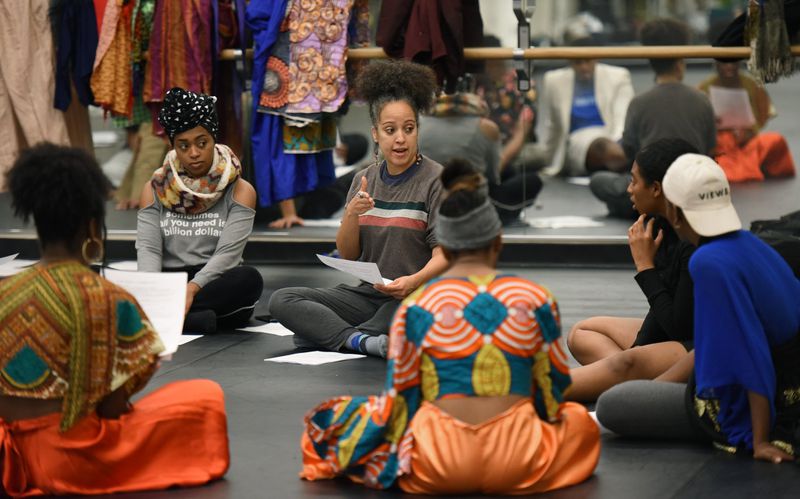 Julie Johnson, senior lecturer, speaks to students from the University of Georgia and Morehouse and Spelman colleges, who have teamed up to work on a performance about the state’s history of convict labor, before their rehearsal at Spelman College’s Wellness Center. Hyosub Shin / Hyosub.Shin@ajc.com