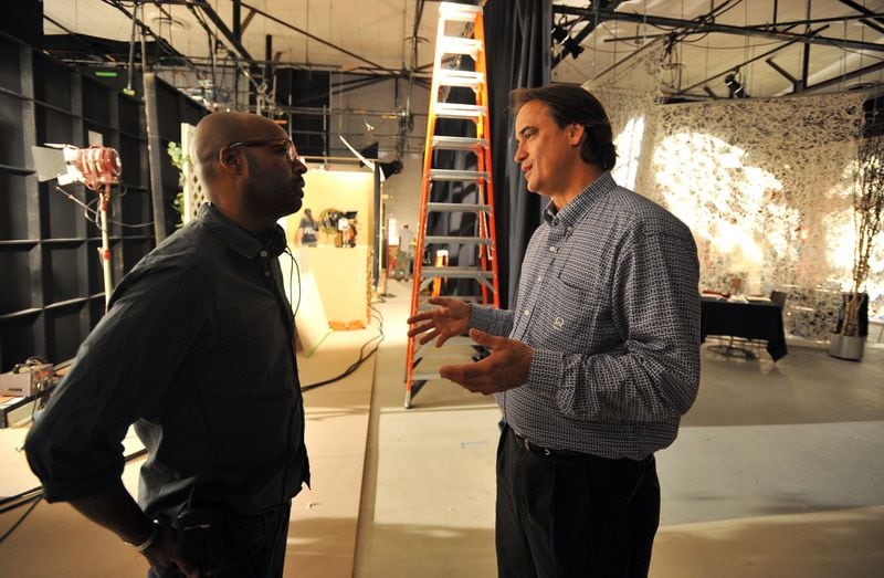 In 2010, Kris Bagwell (right) talks with Salim Akil, writer, producer and director of BET's "The Game." Kris Bagwell, was the new executive vice president for the EUE/Screen Gems Studios at the former Lakewood Fairgrounds, where construction crews were transforming the 30-acre property into a state-of-the-art film and television production facility. Brant Sanderlin/AJC FILE