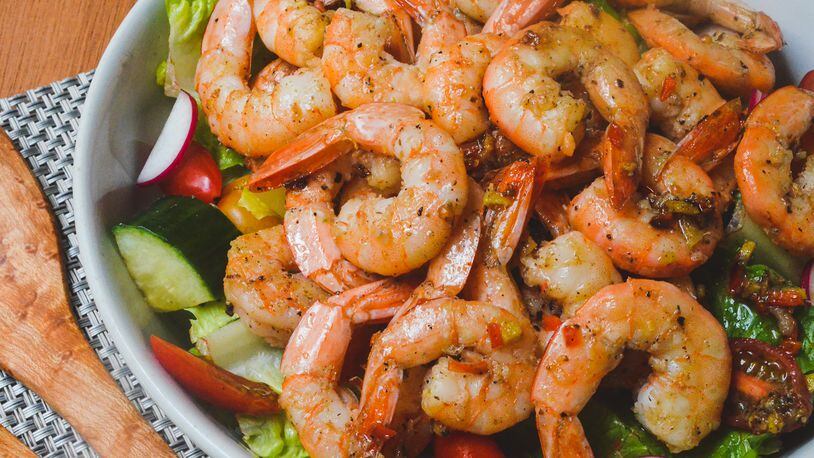 Sichuan Salt and Pepper Shrimp on a mixed green salad
(Virginia Willis for The Atlanta Journal-Constitution)