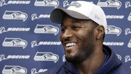 Seattle Seahawks’ Derrick Coleman speaks with reporters before NFL football practice Thursday, Jan. 16, 2014, in Renton, Wash. The Seahawks play the San Francisco 49ers on Sunday in the NFC championship game. (AP Photo/Elaine Thompson)