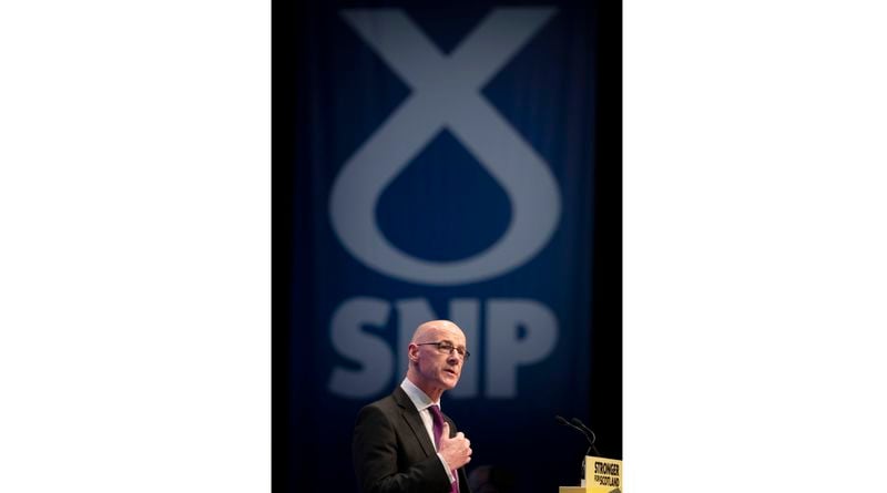 FILE - Deputy First Minister John Swinney delivers his address to delegates during the 2019 SNP autumn conference at the Event Complex in Aberdeen, Oct. 14. 2019. John Swinney was elected Monday, May 6, 2024 as leader of the SNP after no other candidates came forward. (Jane Barlow/PA via AP, File)