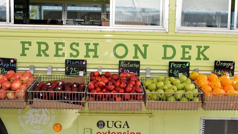 Each week, DeKalb County’s mobile farmers market visits 10 locations, with fresh produce, and cooking and nutrition lessons. Courtesy: Fresh on Dek