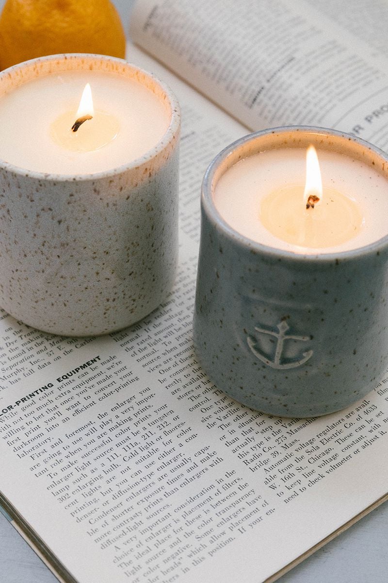 Candles set the mood for al fresco dining, offering an inviting scent and creating a relaxing environment.  Courtesy of Air and Anchor