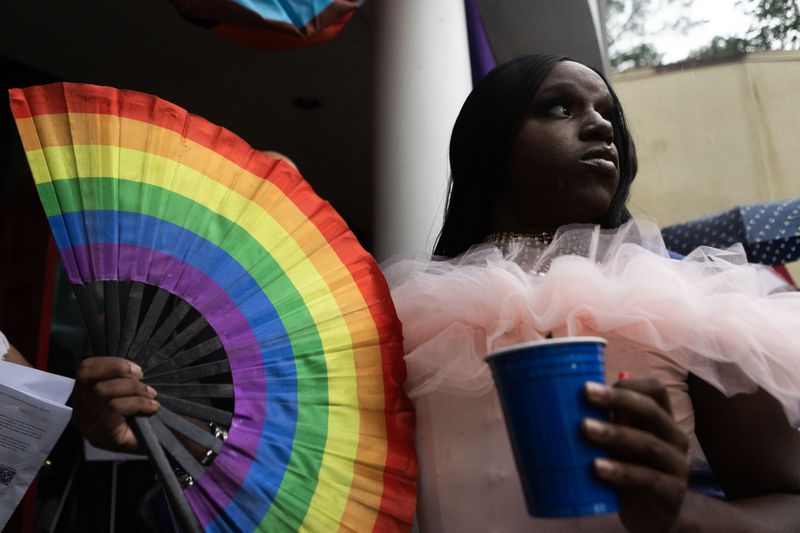 Cleopatra Rose holds a rainbow fan after the Drag Me to Church event at Atlanta's St. Luke Lutheran in June. Photo: Michael Blackshire/michael.blackshire@ajc.com