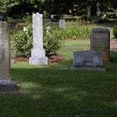 Newly restored headstones stand in Oakland Cemetery's  African-American Burial of grounds Friday, June 10, 2022. The 3.5-acre area within Oakland Cemetery’s 48 acres has not undergone large-scale restoration in more than a century, but thousands of donors pitched in. (Steve Schaefer / steve.schaefer@ajc.com)