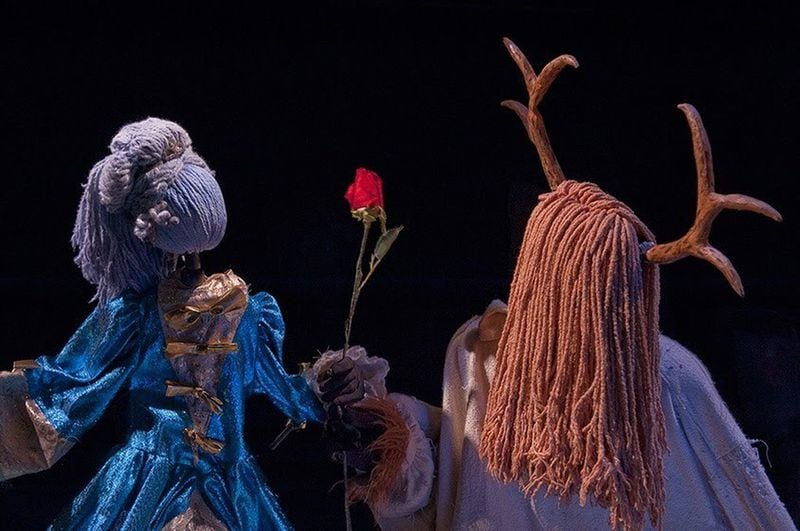 The characters are fashioned from found objects is this Center for Puppetry Arts production of “Beauty and the Beast, including mops and a parasol. CONTRIBUTED: KATHRYN KOLB/CENTER FOR PUPPETRY ARTS