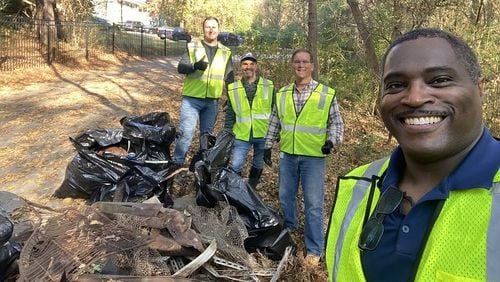 Volunteers are needed for the next Great Dunwoody Cleanup on Nov. 4 - rain or shine. Among those involved with cleaning Dunwoody's Pernoshal Park last year were (L to R) Dunwoody Construction Engineer Alan Christie, Stormwater Capital Projects Manager Javier Sayago, Construction Manager Todd Meadows and Stormwater Manager Carl Thomas. (Courtesy of Dunwoody)
