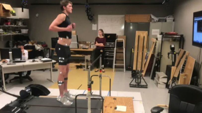Georgia Tech center Ben Lammers jumps on a treadmill equipped with a force plate last fall at the school's Comparative Neuromechanics Laboratory.