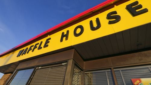 Two men are in custody in connection with the shooting death of a man at a Middle Georgia Waffle House.