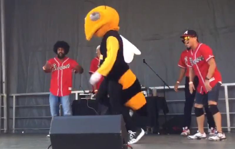 Buzz dances at a street festival outside the College Football Hall of Fame August 25, 2018. (Screen capture of a Twitter video)