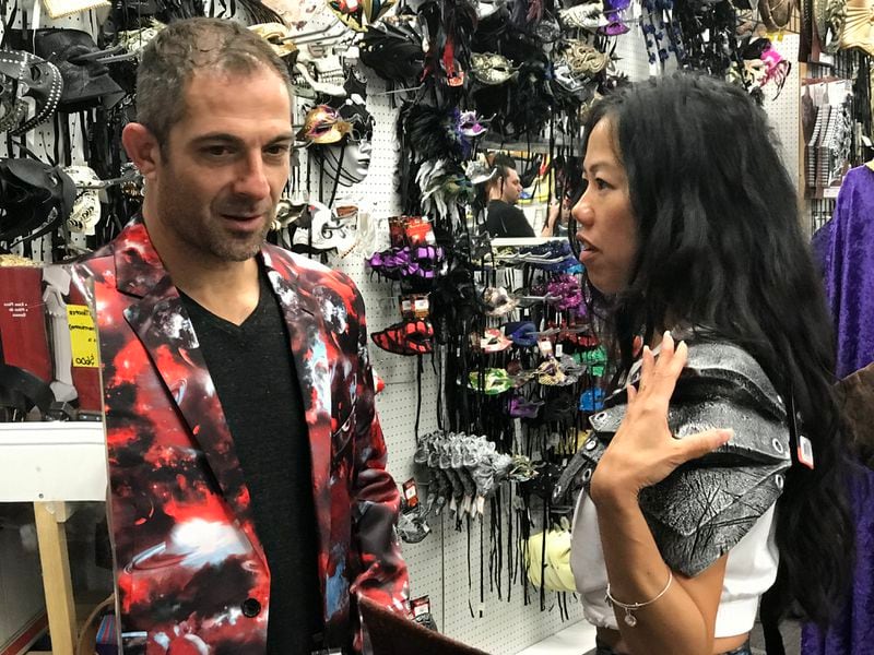 Brian Levine and Eileen Chua of California shop at Costumes Etc. as they prepare to go to Dragon Con. CREDIT: Shelia Poole