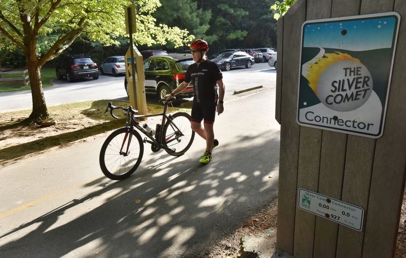 August 9 2019 Smyrna - Barry Goppman prepares to ride his bike on the Silver Comet Trail at Mavell Road trailhead on Friday, August 8, 2019. Barry Goppman is an avid biker and runner battling cancer. Goppman lives not far from the Sterigenics plant and fears there may be a connection to emissions there. (Hyosub Shin / Hyosub.Shin@ajc.com)