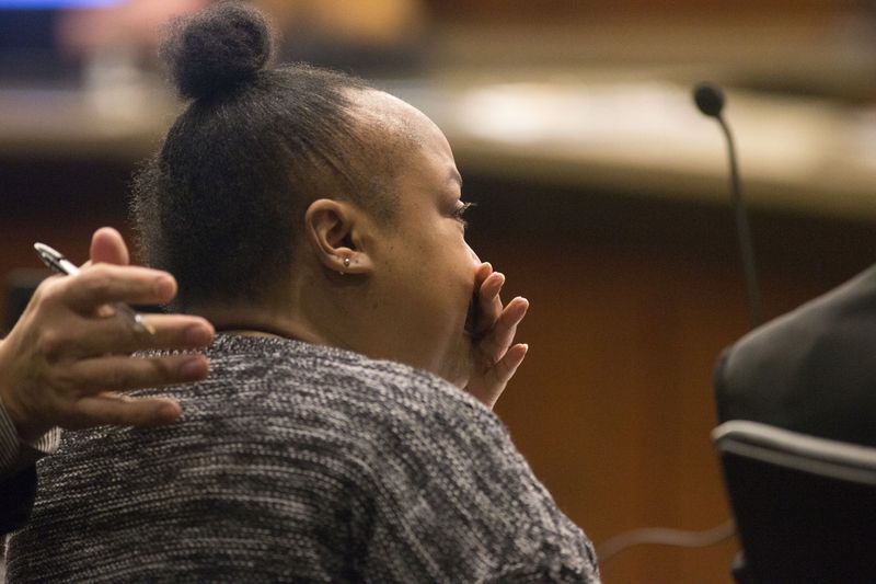Erica White becomes emotional during her trail at Cobb County Superior Court, Monday, January 22, 2018. 