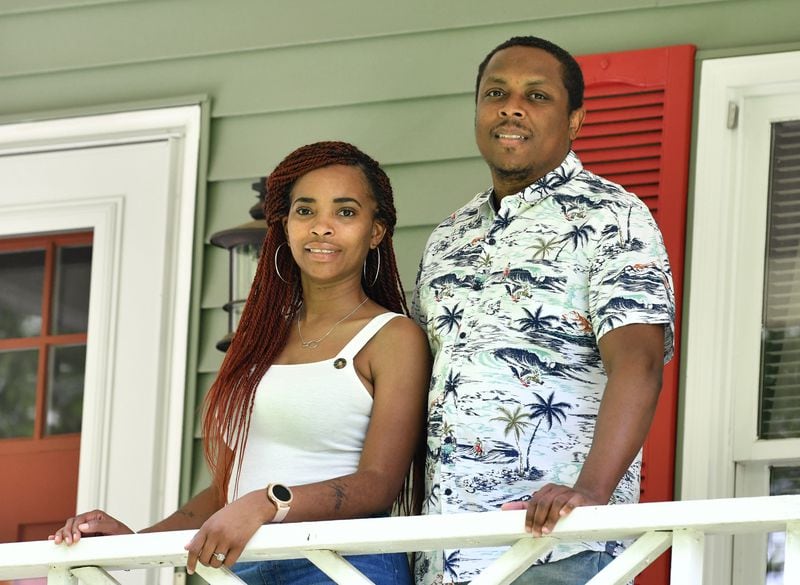 Alanteo “Henry” Hutchinson and his girlfriend, Tameka Atkinson, seen here at their home in West Point, both tested positive for COVID-19 in early June. This month, the number of confirmed COVID-19 cases has more than doubled in Troup County, and more than two dozen people have died from it. HYOSUB SHIN / HYOSUB.SHIN@AJC.COM