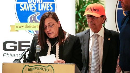 Anna Morsaw (left) speaks during the Dori Saves Lives Foundation’s annual traffic safety awareness event — “Staying Alive on 95 & Florida’s Roadways” — in Boynton Beach Thursday, June 9, 2016. Morsaw is the mother of rising MMA star Jordan Parsons, who was killed by a hit-and-run driver in Delray Beach. “Words cannot express the loss that our family and friends have endured since Jordan’s passing,” she said. At center is Representative Irving Slosberg; at right is Neil Melanson. (Bruce R. Bennett / The Palm Beach Post)