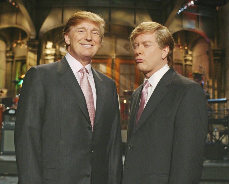 Donald Trump, left, star of "The Apprentice," joins Saturday Night Live's Darrell Hammond, who is in character as Trump, as they shoot promo spots for this Saturday's edition of NBC's "Saturday Night Live," in New York, Thursday, April 1, 2004. Trump will host the live telecast Saturday, April 3. (AP Photo/NBC, Mary Ellen Matthews) ORG XMIT: NYR104 (television programs)
