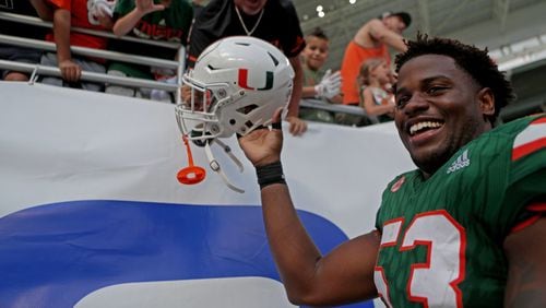 University of Miami linebacker Zach McCloud interacts with the crowd after defeating the University of Virginia in 2017. (John McCall/South Florida Sun Sentinel/TNS)